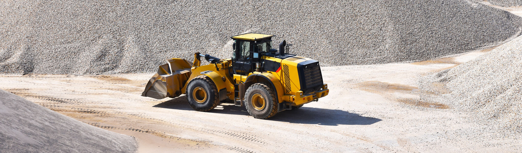 Wheel Loader By Gravel Pile
